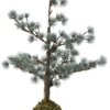 På billedet ser du variationen Juletræ med lys fra brandet House Doctor i en størrelse H: 50 cm. i farven Grå
