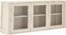 På billedet ser du et stemningsbillede (#8) fra Seaham, Vægskab, 3 glaslåger fra brandet Raymond & Hallmark i en størrelse H: 60 cm. B: 150 cm. i farven Hvid (oileret)