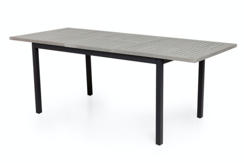 På billedet ser du variationen Albany, Udendørs spiseborde med udtræk fra brandet Venture Design i en størrelse H: 75 cm. x B: 100 cm. x L: 224 cm. i farven Sort/Grå